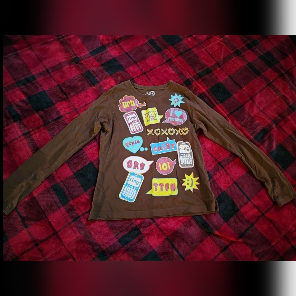 #866- girls long sleeve shirt large